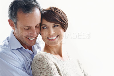 Buy stock photo Happy couple, romance and bonding on break, loyalty or embrace with partner and marriage commitment. White background, mature man and woman with smile, space and connection with spouse in Canada