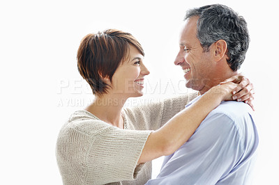 Buy stock photo Happy, hug and couple in studio by space with love, bonding and safety in marriage with affection. Smile, connection and woman embracing man for care, trust and commitment by white background.