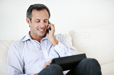 Buy stock photo Businessman, phone call and smile with tablet in house, freelancer and financial advice for contact. Remote work, consultation and mature person with mobile, online and wealth management in home