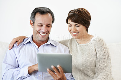 Buy stock photo Sofa, laughing and happy couple with tablet for funny entertainment or comedy together. Man, woman or smile with technology, joke or humor for streaming app, online subscription or network service