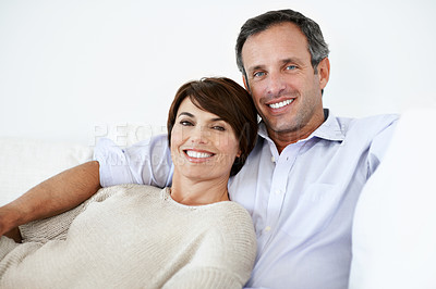 Buy stock photo Love, portrait or couple on couch with day off, partner bonding or cozy cuddle on weekend break. Happy, mature man or woman in house with unwind, relax together or calm moment in romantic connection.