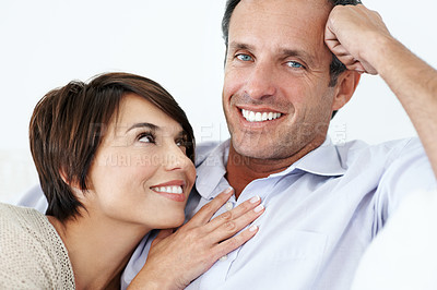 Buy stock photo Relax, smile or couple in home with love, partner care or bonding cuddle on weekend break. Portrait, mature man or woman in house with trust, unwind together or peaceful moment in romantic connection