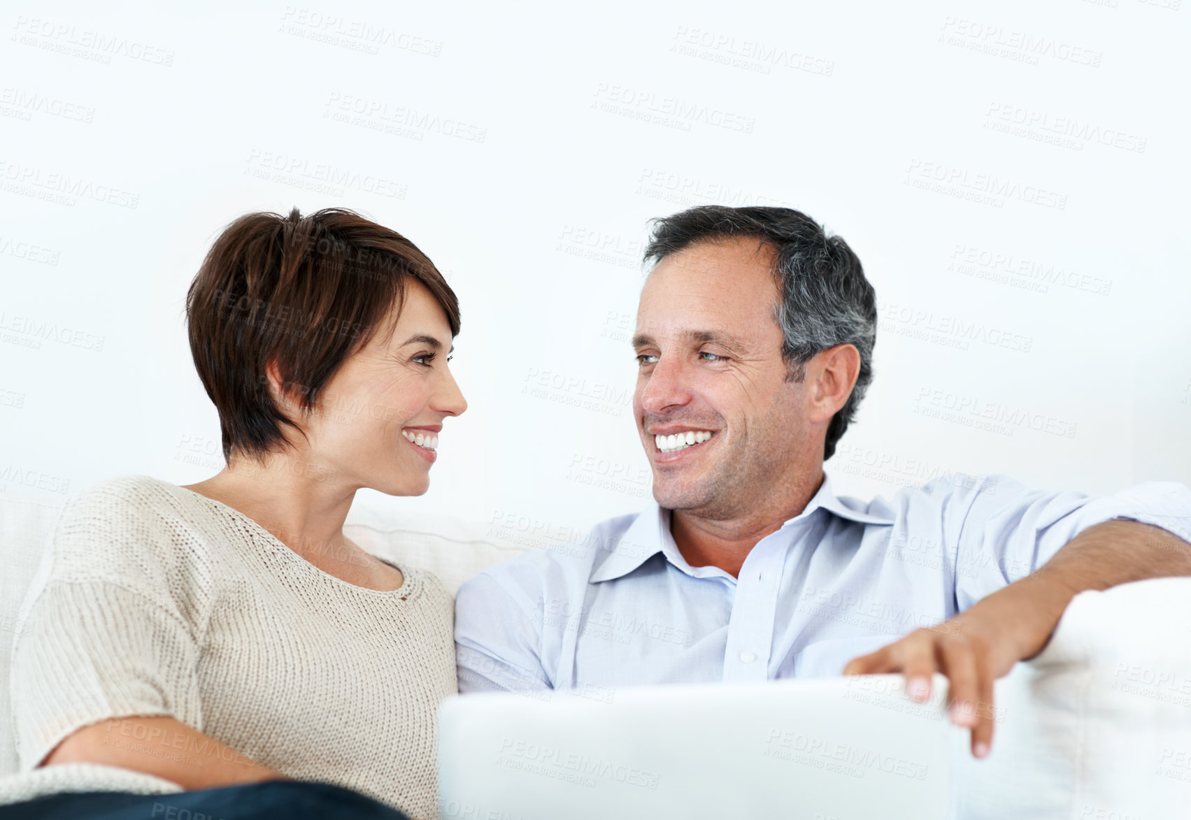 Buy stock photo Happy, laptop and couple relax on home sofa for online connection, browsing and internet on weekend. Mature man, woman and tech in house living room for streaming, subscription or planning on website