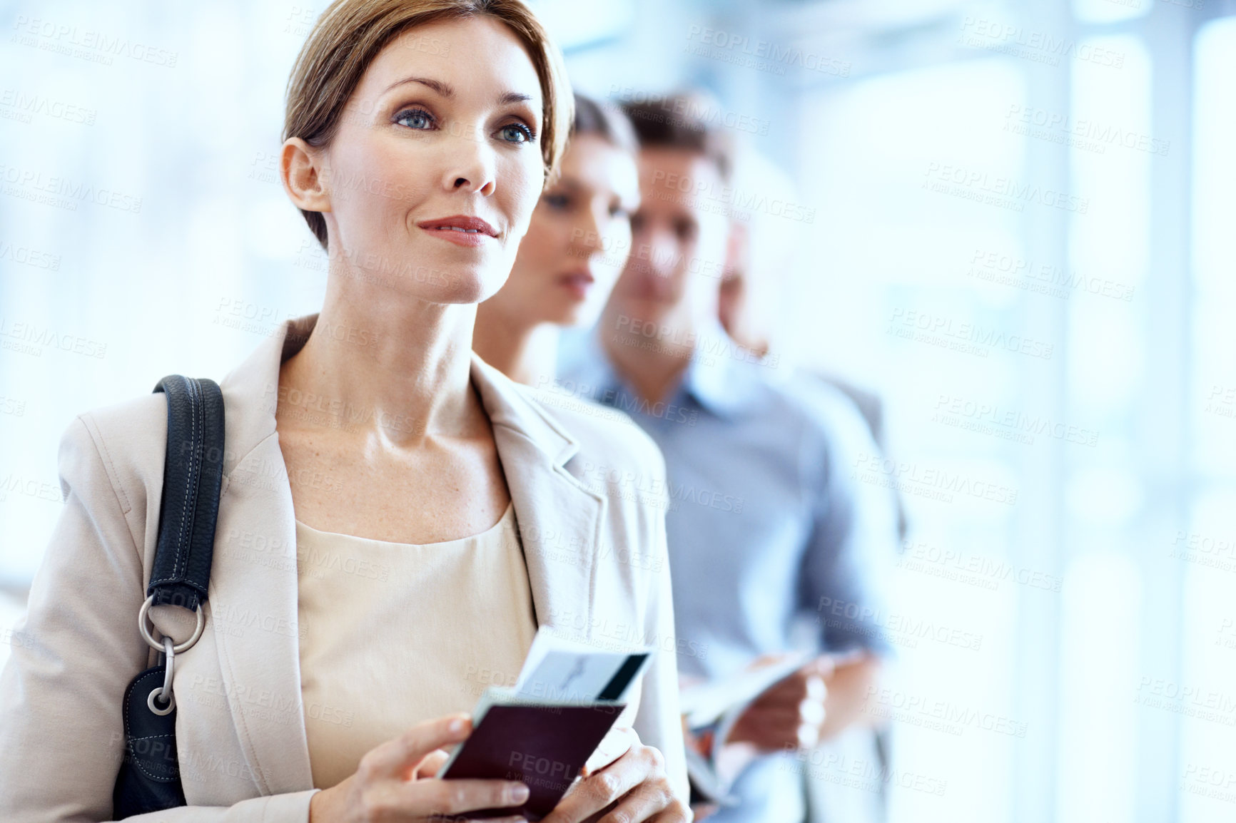 Buy stock photo Businesswoman, travel or wait in airport with passport, flight ticket or line up for overseas work trip. Person, queue and ID documents in terminal for departure, smile and leave for job opportunity.