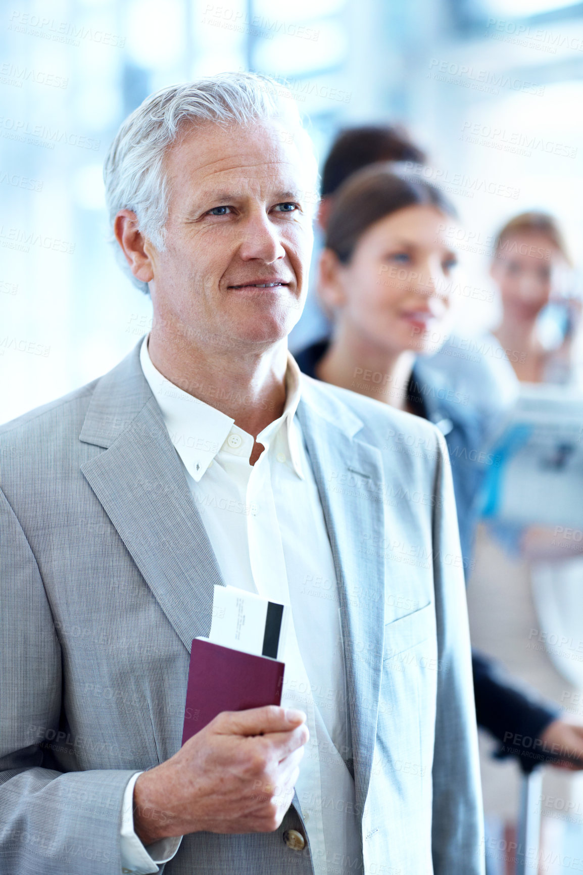 Buy stock photo Businessman, travel and line up in airport with passport, flight ticket and departure for work trip. Mature person, wait and queue in airline terminal with ID document, job convention and boarding.