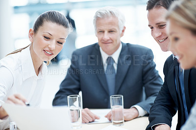 Buy stock photo Corporate, meeting and business people in office with paperwork, financial statement and audit manager. Accounting, team and discussion in firm with documents, finance review or planning for company.