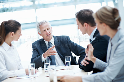 Buy stock photo Business people, meeting and team discussion with CEO in office for financial compliance, report or briefing. Plan, manager and person with proposal, investment regulation or risk management strategy