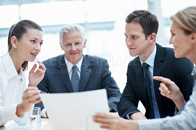 Buy stock photo Corporate, meeting and business people in office with documents, financial statement and audit manager. Accounting, team and discussion in firm with paperwork, finance review or planning for company.