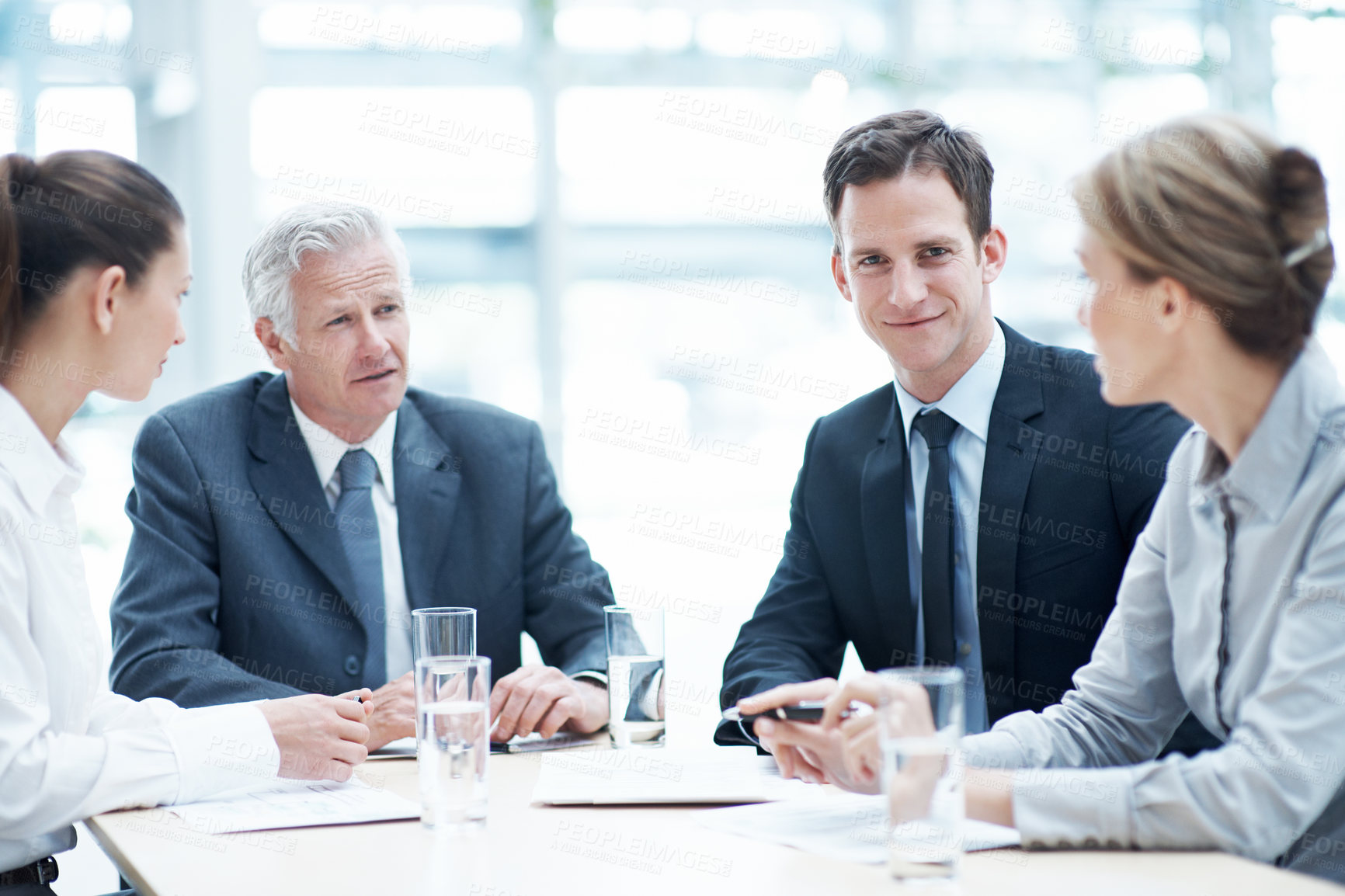 Buy stock photo Man, lawyer and team in office for meeting, court case and documents with witness statement. Portrait, attorney or staff with paperwork in workplace for evidence, confidential information and lawsuit