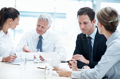 Buy stock photo Corporate, boardroom and business people with advisor for discussion, investment proposal and planning. Office, teamwork and workers talking with paperwork for financial report, meeting and review