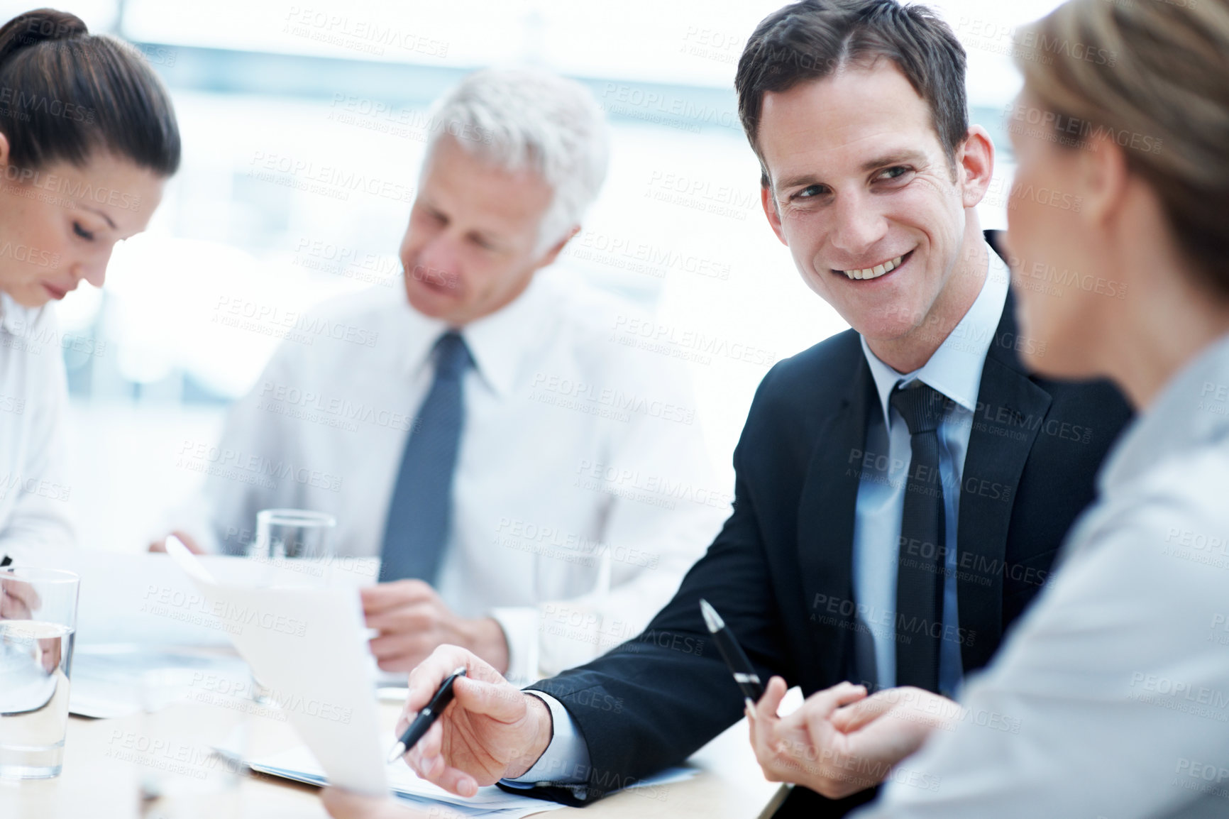 Buy stock photo Corporate, boardroom and business people with advisor for meeting, investment proposal and planning. Office, teamwork and workers talking with paperwork for financial contract, merger and evaluation