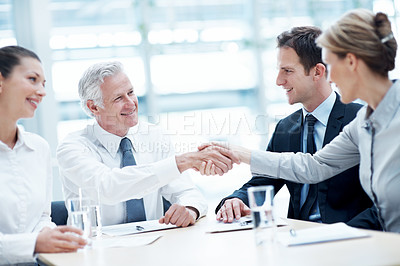 Buy stock photo Shaking hands, meeting and business people in office for deal, agreement or legal settlement. Team, discussion and attorneys with general counsel for handshake on court case, law or mediation process