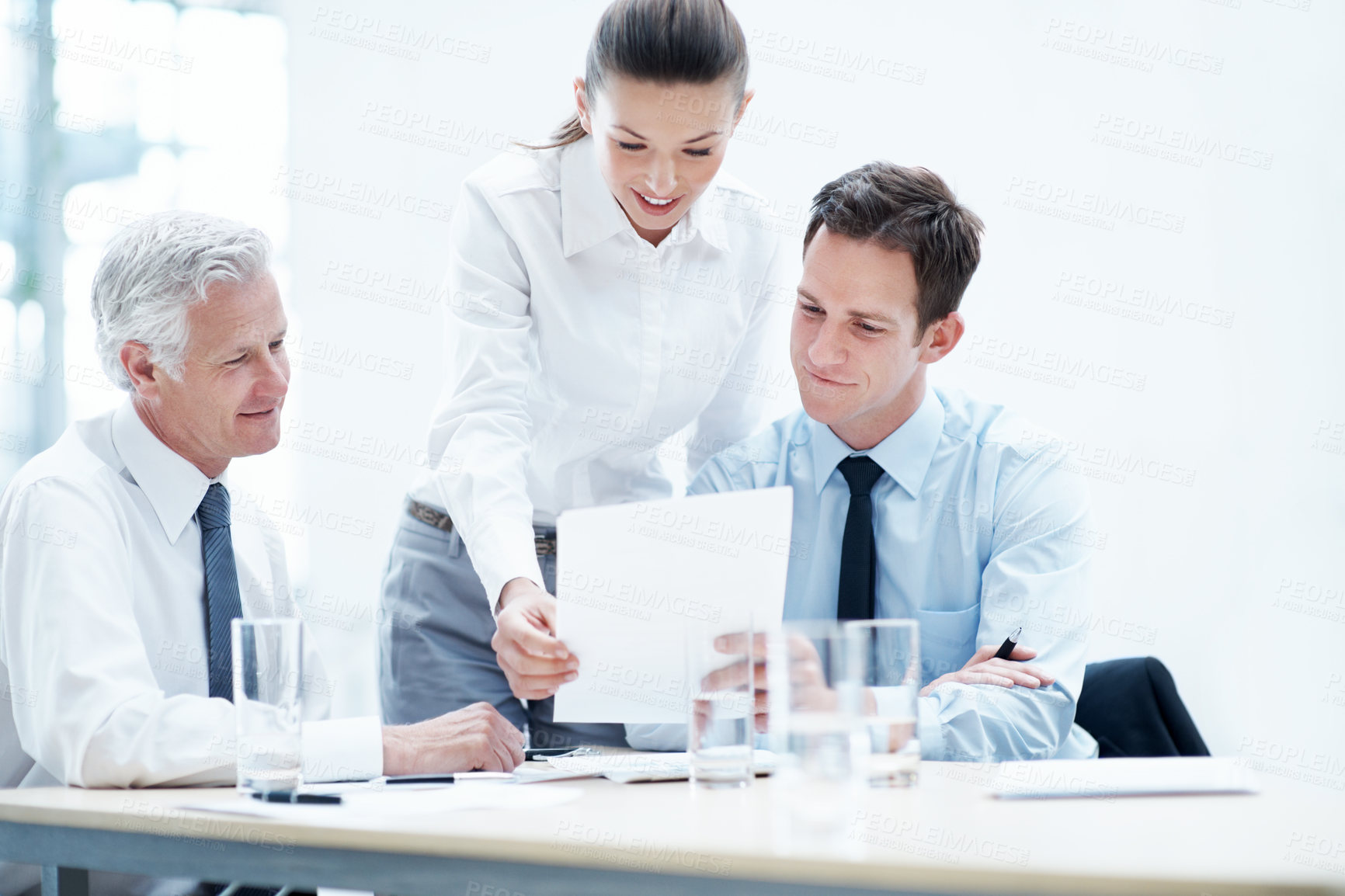 Buy stock photo Office, feedback and business people with documents, finance review and proposal with manager. Corporate, team and woman with men for paperwork, discussion and financial report for budget planning