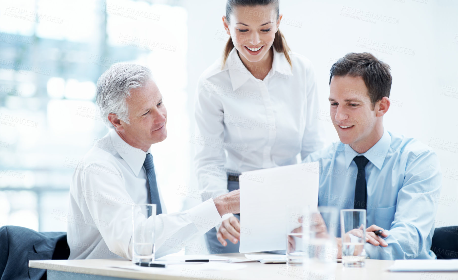Buy stock photo Office, talking and business people with paperwork, finance review and proposal with manager. Corporate, team and woman with men for documents, discussion and financial report for budget planning