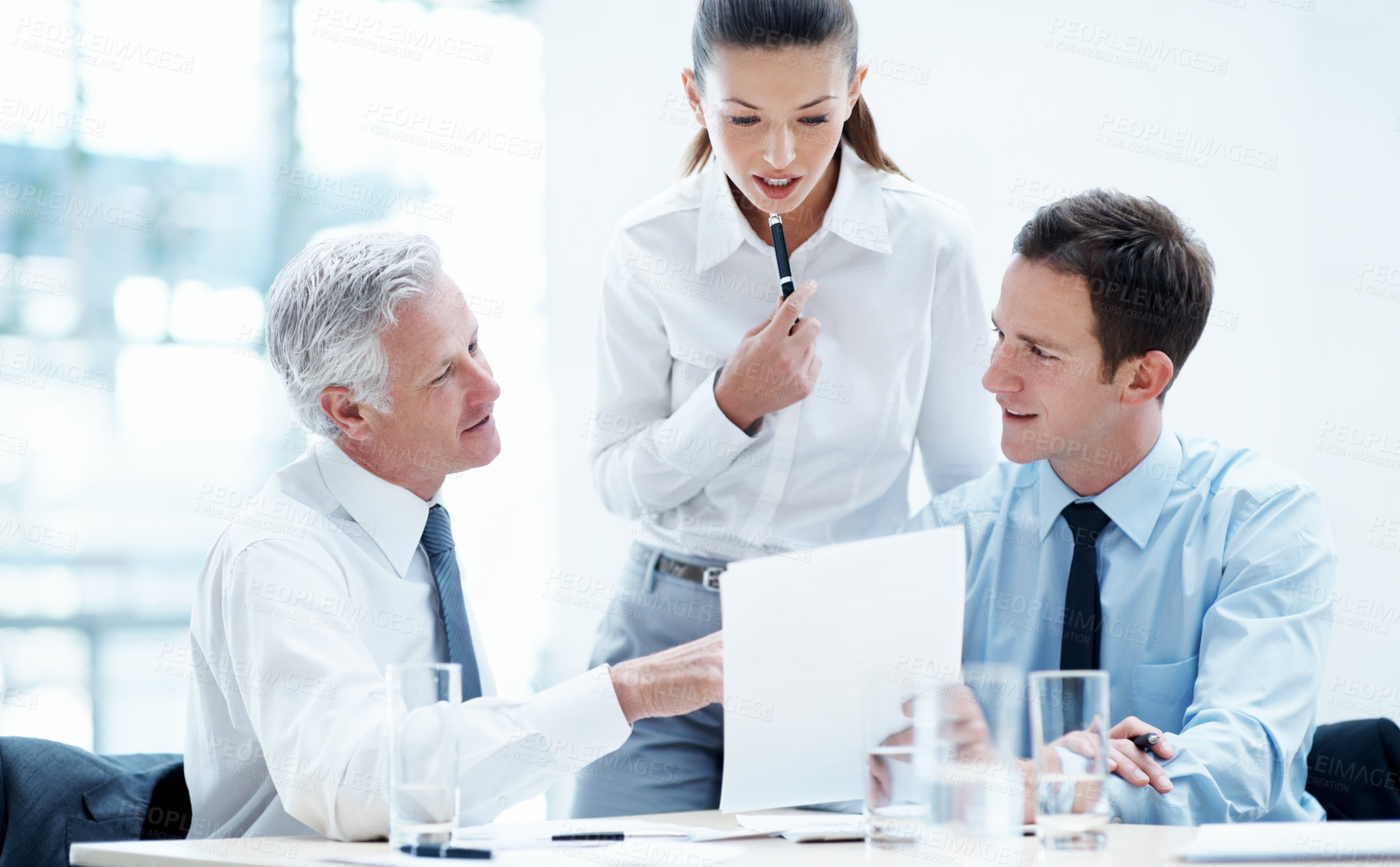 Buy stock photo Office, discussion and business people with documents, finance review and proposal with manager. Corporate, team and woman with men for paperwork, meeting and financial report for budget planning