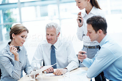 Buy stock photo Business, meeting or team in firm with paper, strategy insight or feedback in budget review. Collaboration, people or finance advisors with document, funding evaluation or forecast in revenue report.