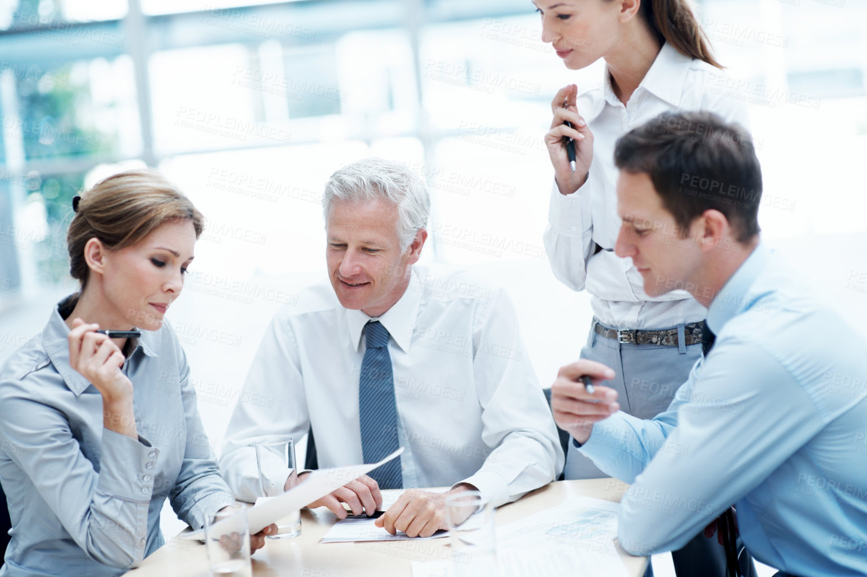 Buy stock photo Business, meeting or team in firm with paper, strategy insight or feedback in budget review. Collaboration, people or finance advisors with document, funding evaluation or forecast in revenue report.