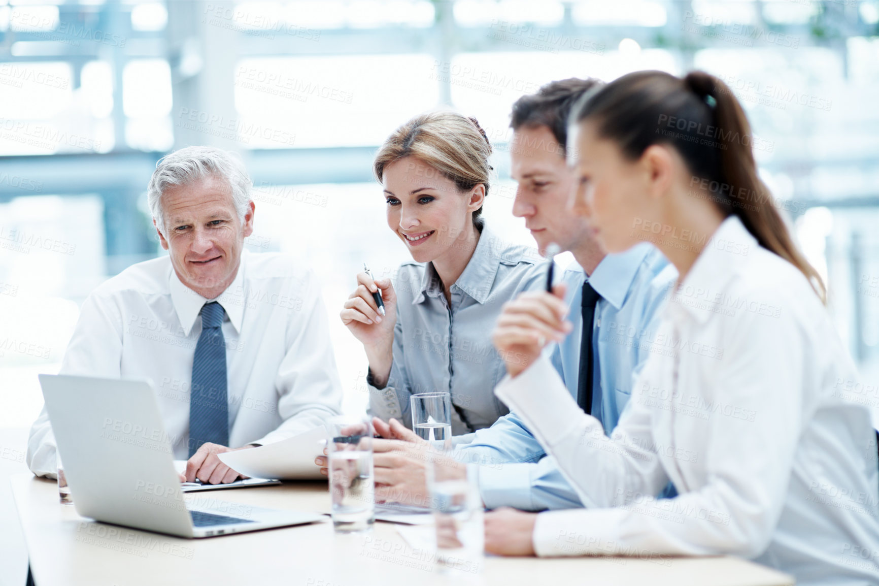 Buy stock photo Corporate, team and manager at law firm with laptop, paralegal and lawyer research for litigation. Attorney, people and planning in office with computer, strategy and administration for court case.
