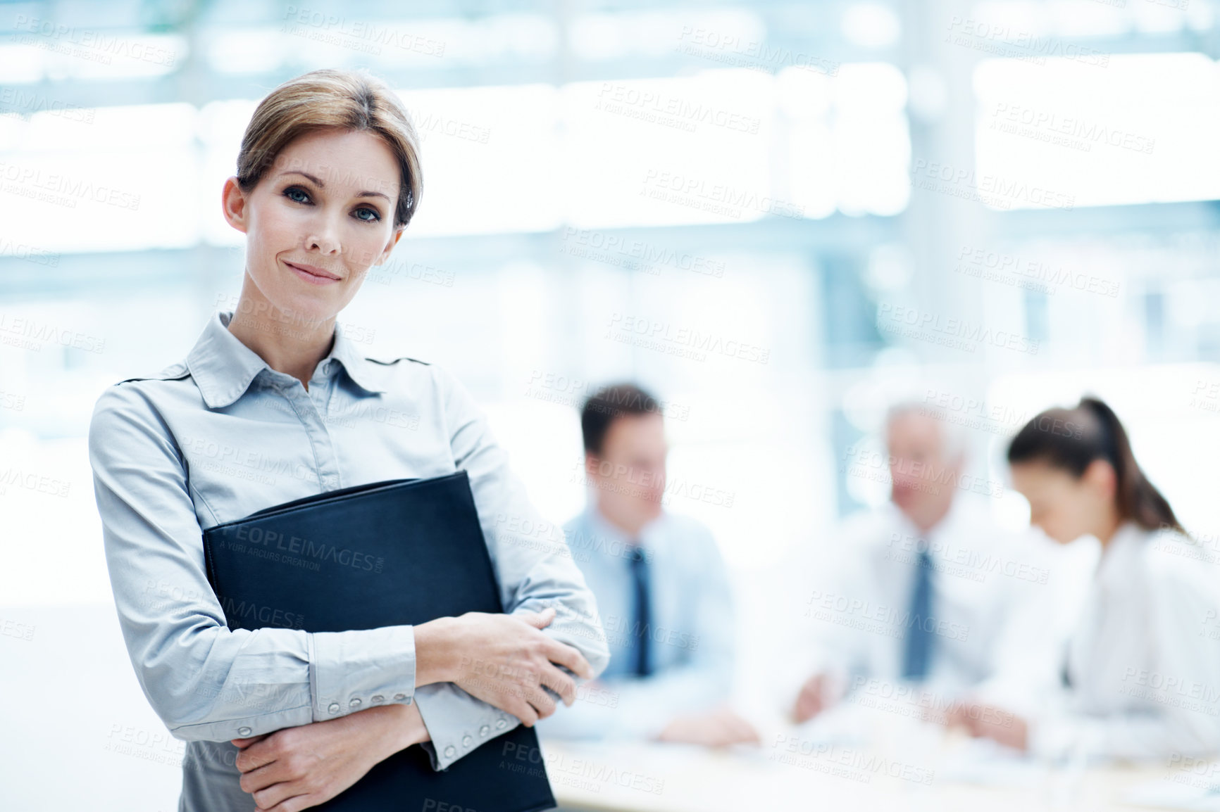Buy stock photo Leadership, smile and businesswoman with arms crossed in meeting, wealth management or career growth. Corporate, portrait and person with folder, investment banking and business development with team