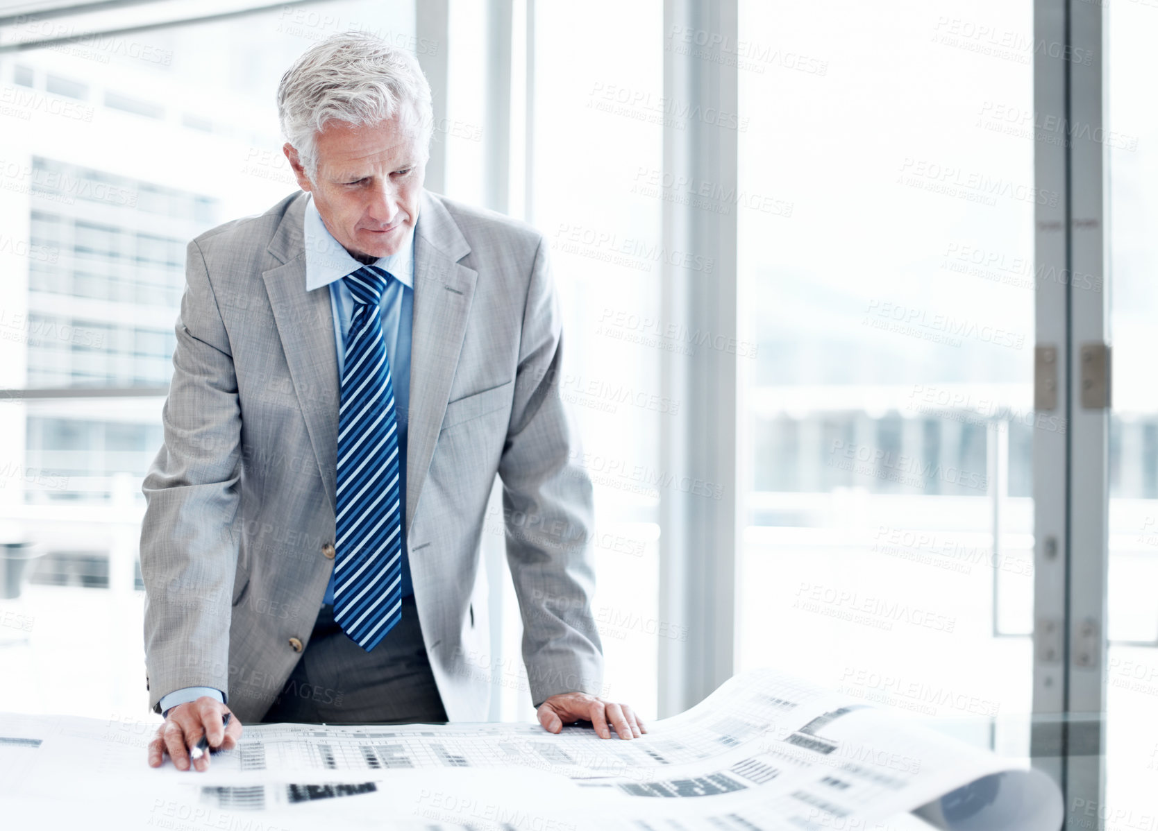 Buy stock photo Businessman, reading and documents in office with budget report, brainstorming and finance management. Mature person, accounting and paperwork in workplace with review, financial planning or thinking