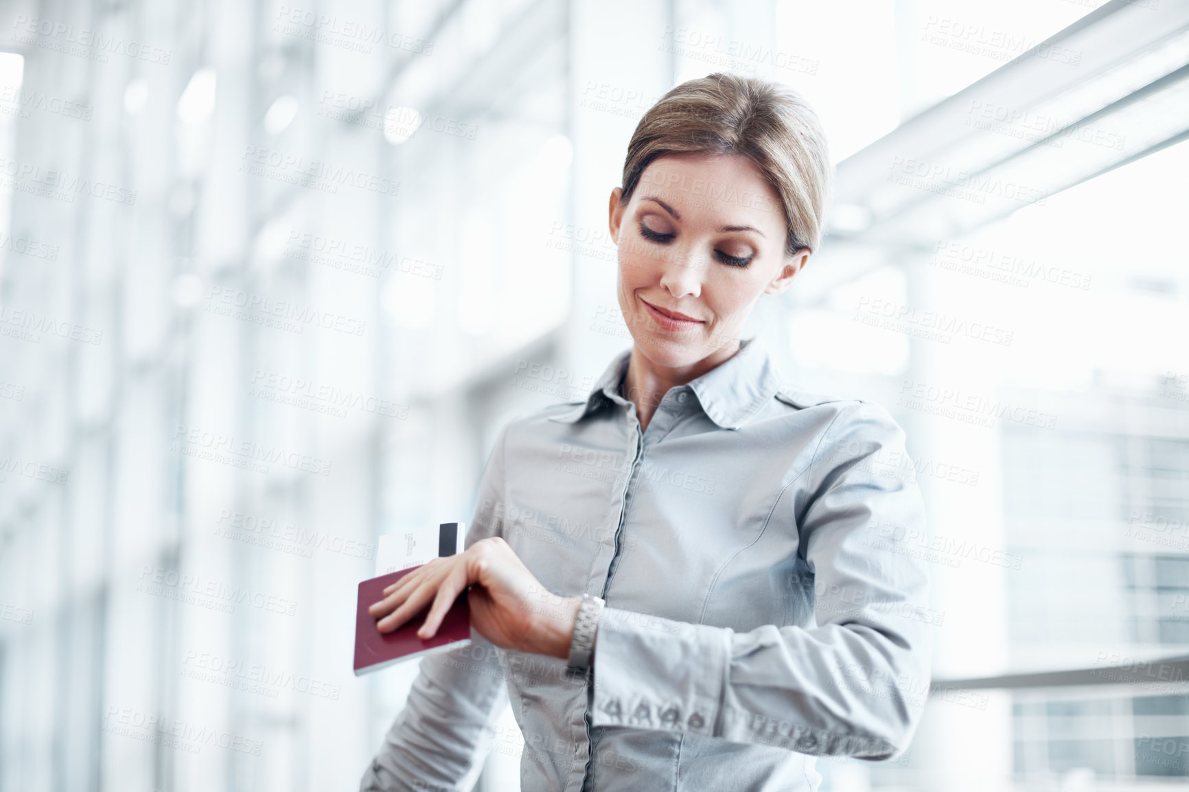 Buy stock photo Airport, ticket and business woman with wrist watch for schedule, travel delay and commute. Professional, space and person with pass, planning and check time for departure, boarding and info for trip