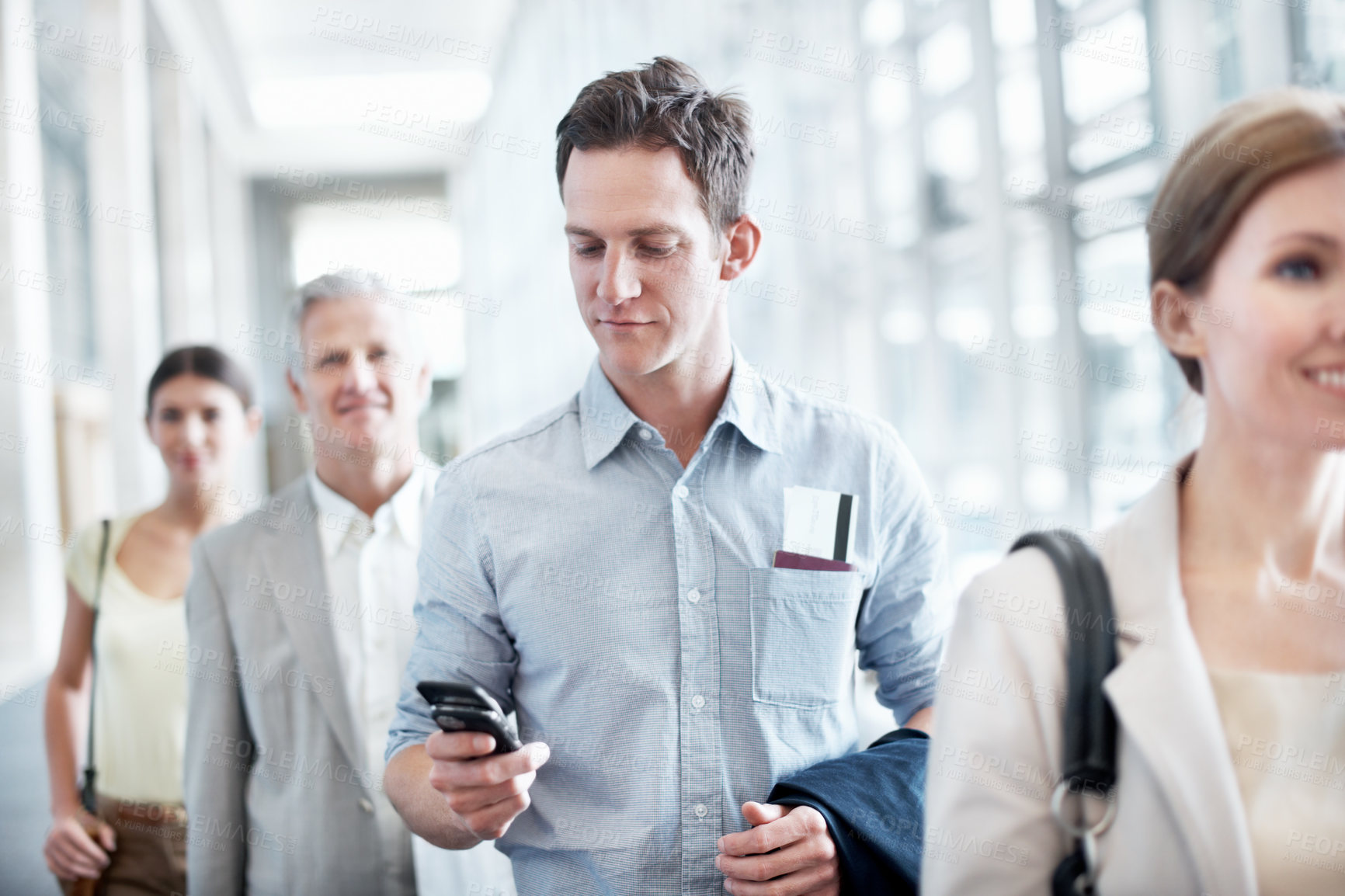 Buy stock photo Travel, phone or businessman in queue at airport for checkin, work journey or check flight schedule. People, passenger and mobile app in line for security checkpoint, boarding time and business trip