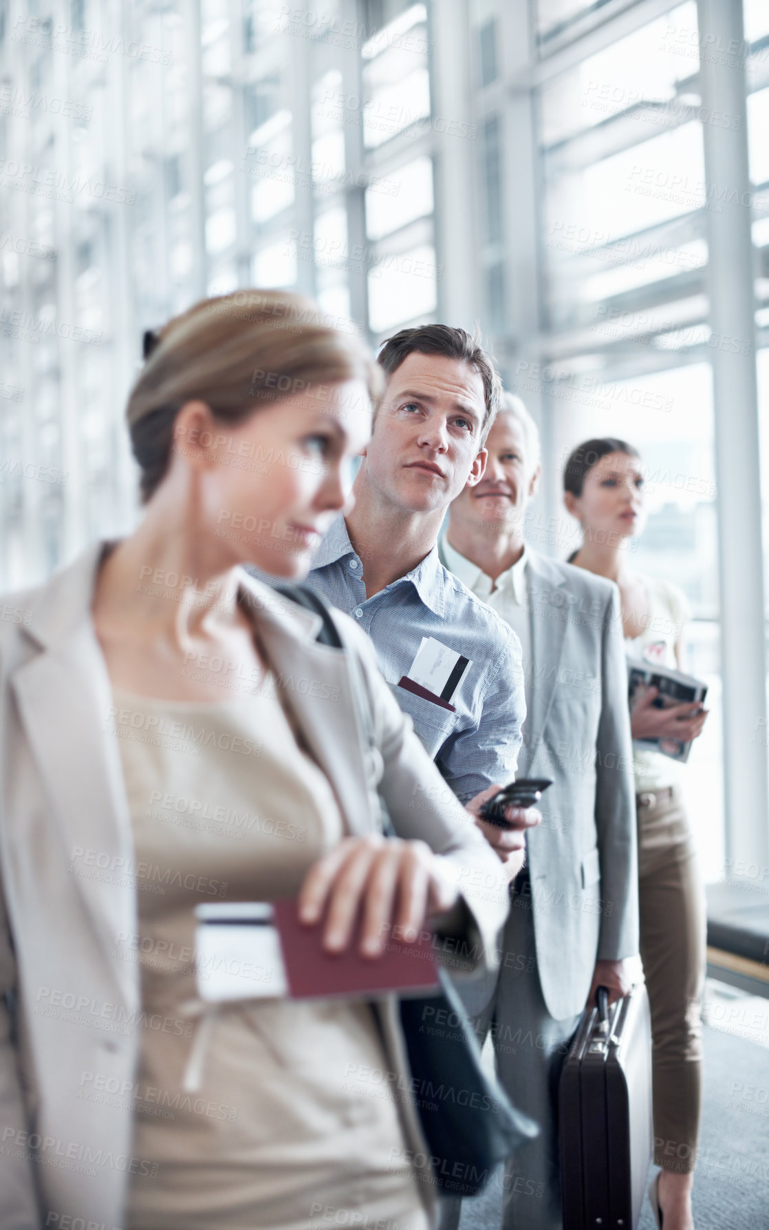 Buy stock photo Travel, phone and man in row at airport for ticket check in, check departure time and work journey. People, passenger and mobile app in queue for security checkpoint, business trip or flight schedule