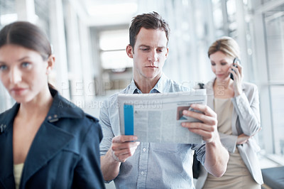 Buy stock photo Man, airport and reading newspaper in queue for travel, business trip and global journey. Article, flight and person waiting in line with update for current events, information or news headline