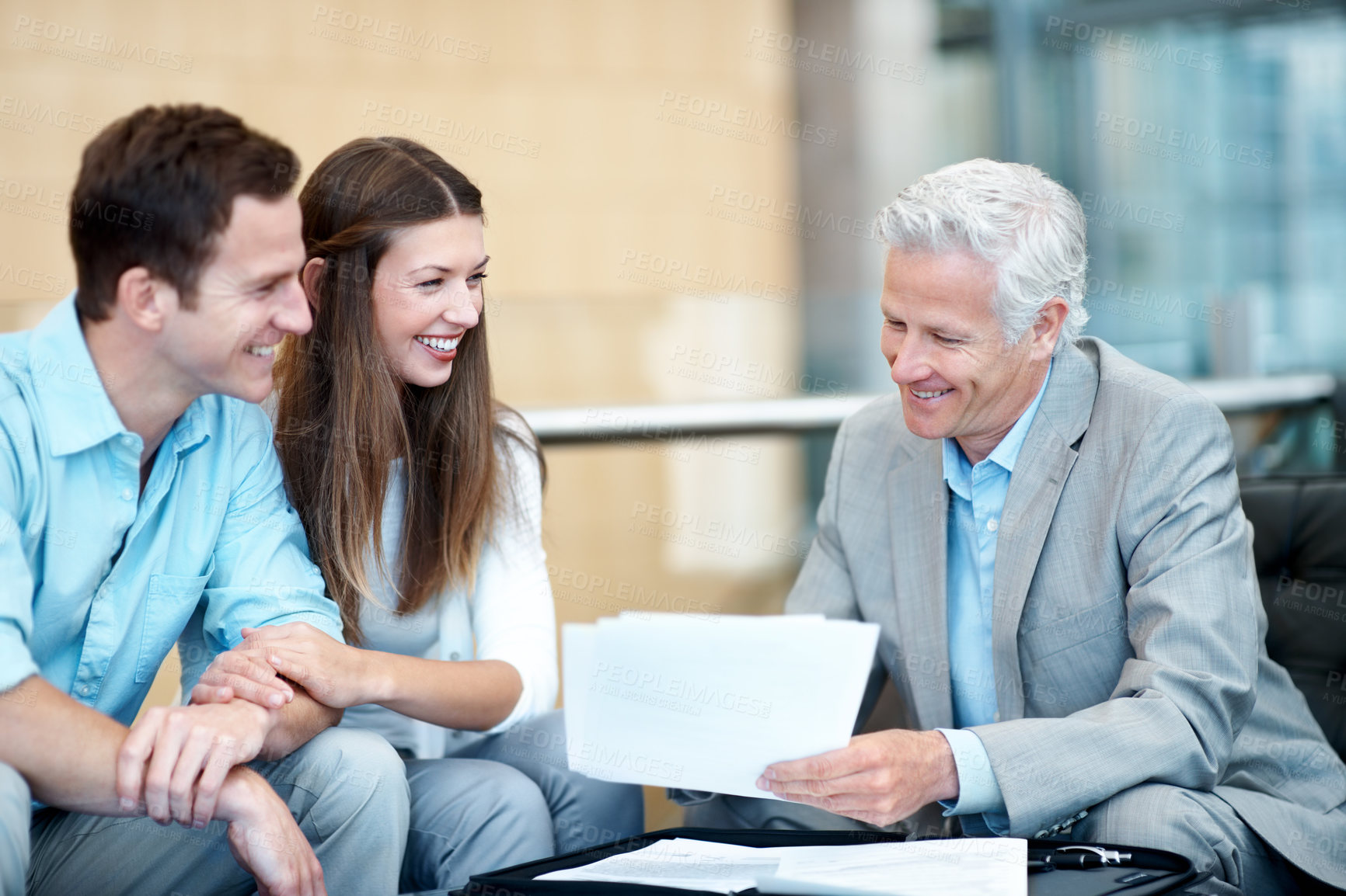 Buy stock photo Businessman, paperwork or lawyer with happy couple in office for legal advice, contract or investment. Man, woman or documents with attorney for asset management, insurance or policy in workplace