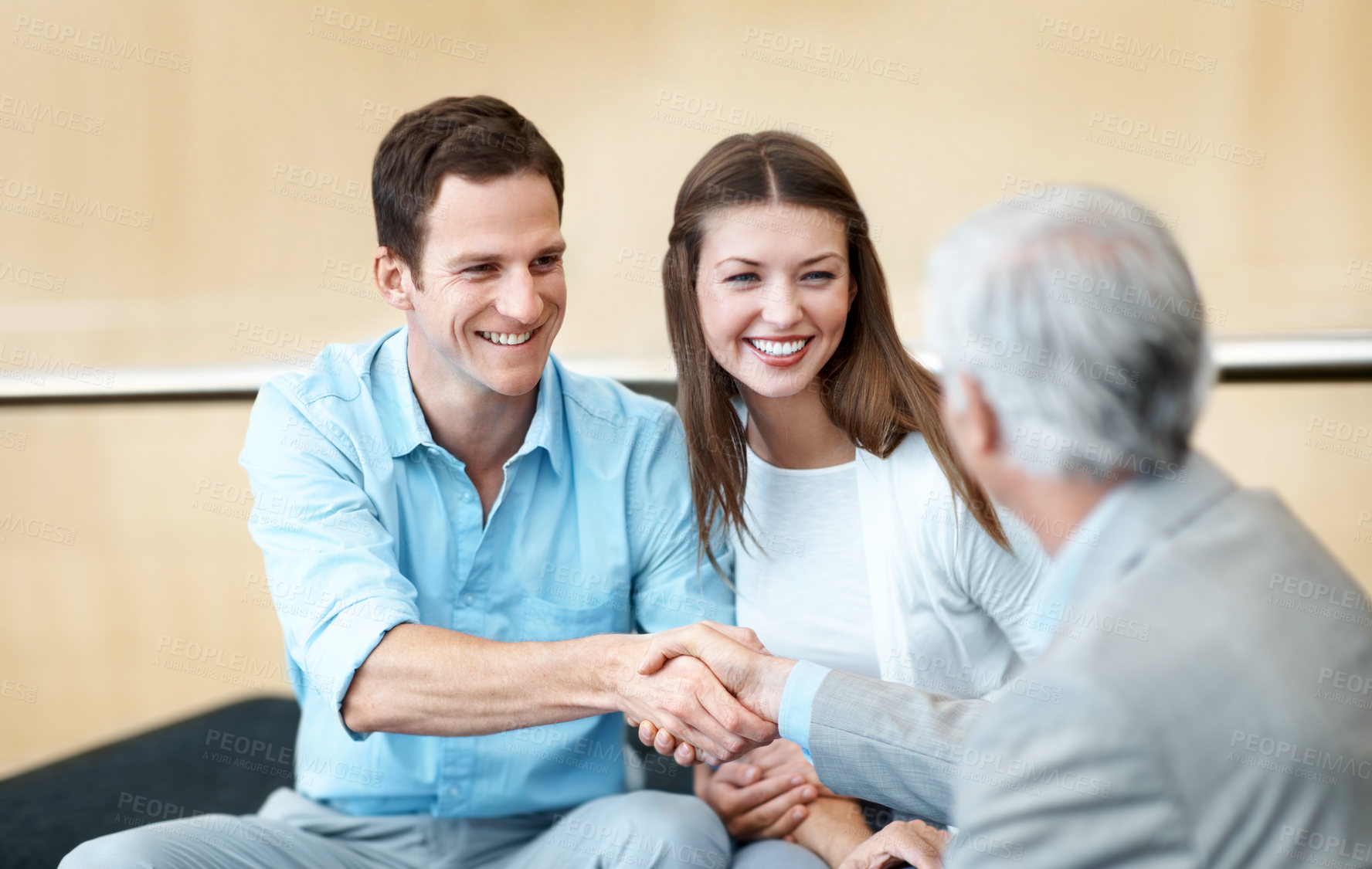 Buy stock photo Businessman, lawyer or handshake with happy couple for legal agreement or partnership in office. Man, woman or shaking hands with attorney, smile or thank you for business deal or assurance together