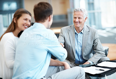 Buy stock photo Businessman, handshake and financial advisor with happy couple for investment partnership in office. Man, woman or shaking hands with accountant, smile or thank you for business deal or contract