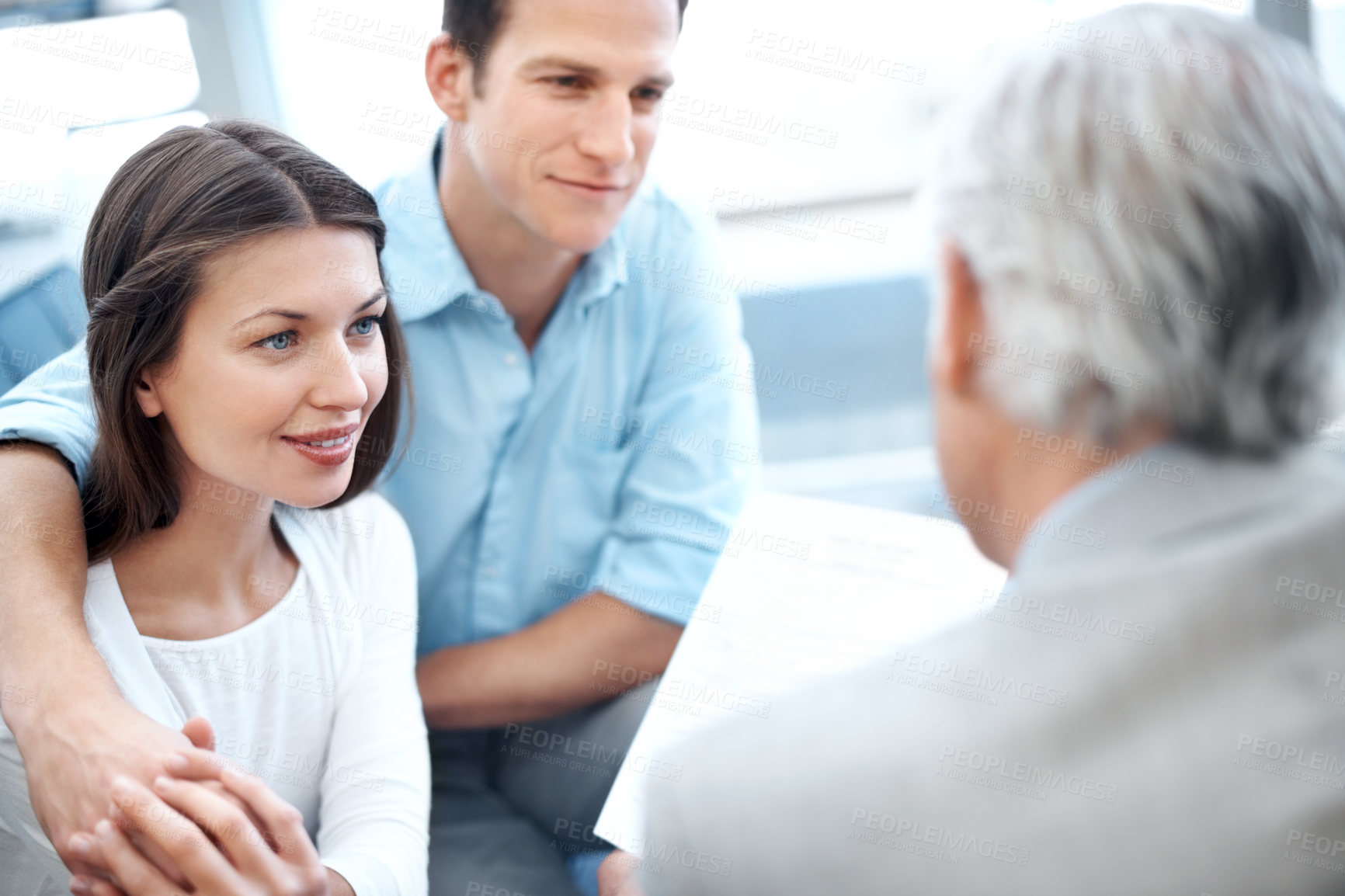 Buy stock photo Listen, holding hands and couple in consultation with insurance agent, financial planning and support. People, dating and policy broker in office with meeting, finance document and risk assessment.