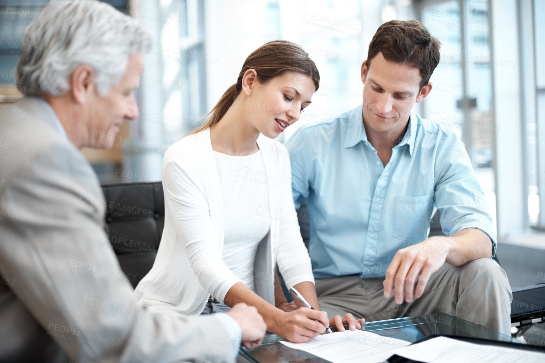 Buy stock photo Signature, documents and meeting lawyer with couple for prenup agreement, consulting and advice. Marriage contract, legal advisor with man and woman in law firm for deal, estate planning and proposal