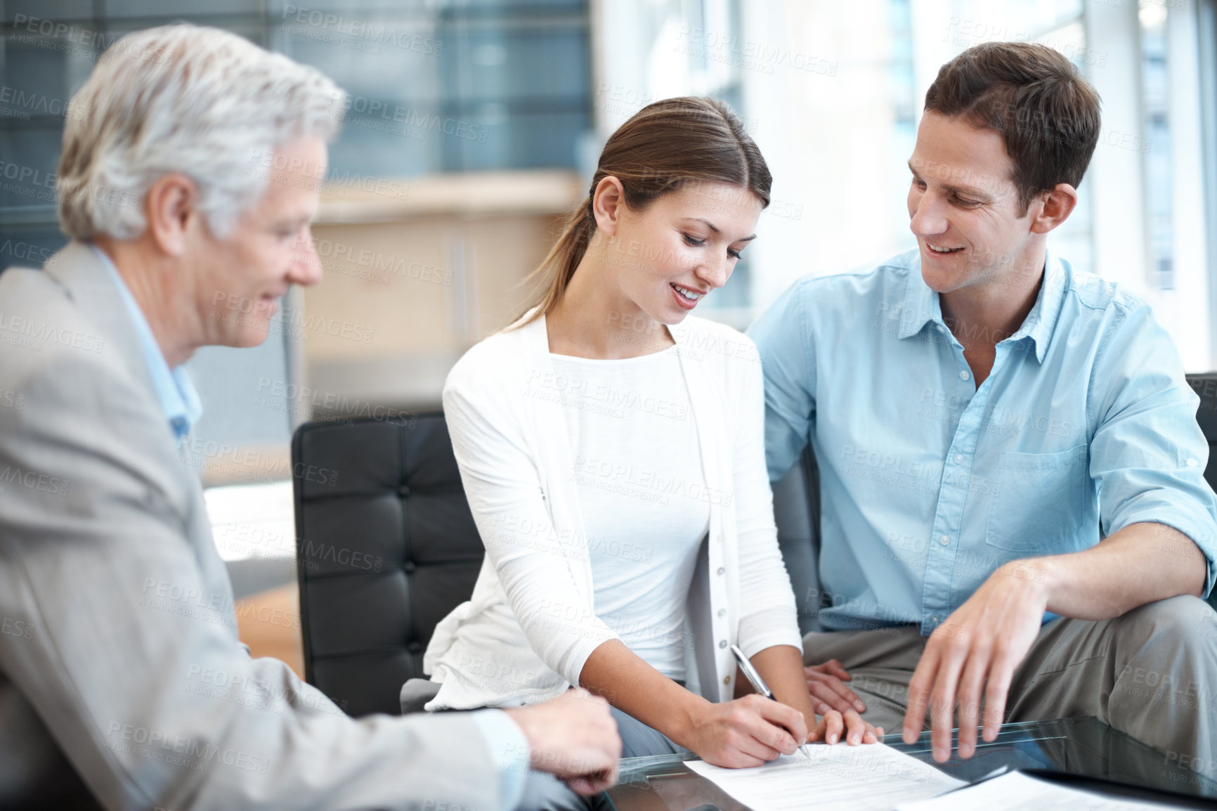 Buy stock photo Signature, documents and lawyer with couple in office for prenup agreement, meeting and advice. Marriage contract, legal advisor with man and woman in law firm for deal, estate planning and proposal