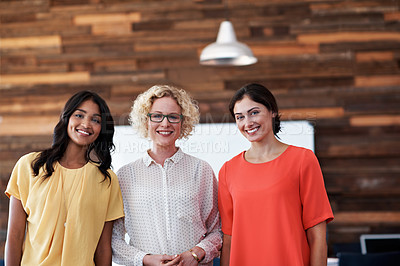 Buy stock photo Portrait of a diverse group of coworkers standing together in an office