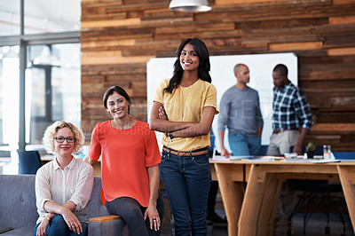 Buy stock photo Portrait of a diverse group of coworkers standing together in an office