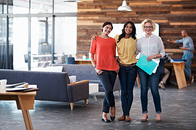 Buy stock photo Portrait of a diverse group of coworkers standing together in an office