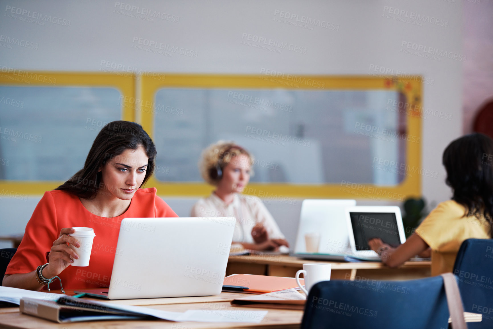 Buy stock photo Laptop, reading and coffee with business woman in office for blog writer, planning and email. Online post update, coworking and copywriting startup with employees in agency for project and story