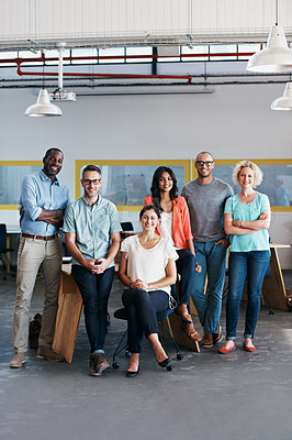 Buy stock photo Portrait of a diverse group of coworkers standing together in an office