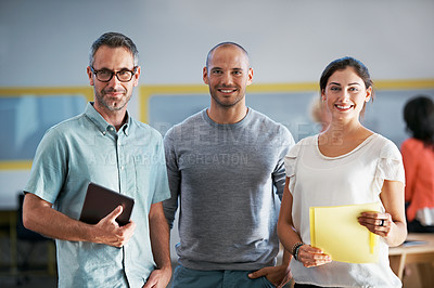 Buy stock photo Portrait of a group of colleagues standing together in an office