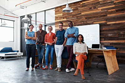 Buy stock photo Portrait of a diverse group of coworkers standing together in an office