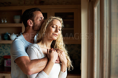 Buy stock photo Cropped shot of a couple in the kitchen