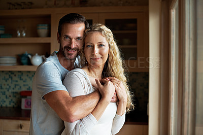 Buy stock photo Cropped shot of a couple in the kitchen