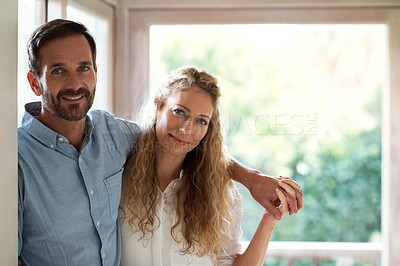 Buy stock photo Cropped shot of a couple standing in their home