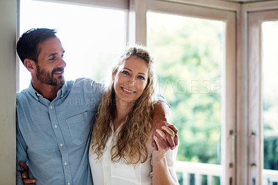 Buy stock photo Cropped shot of a couple standing in their home