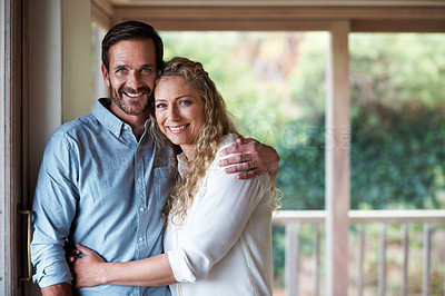 Buy stock photo Cropped shot of a couple standing in their home