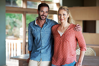 Buy stock photo Cropped portrait of an affectionate couple standing in their home