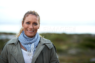 Buy stock photo Cropped portrait of an attractive woman outdoors