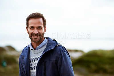 Buy stock photo Cropped portrait of a handsome man outdoors