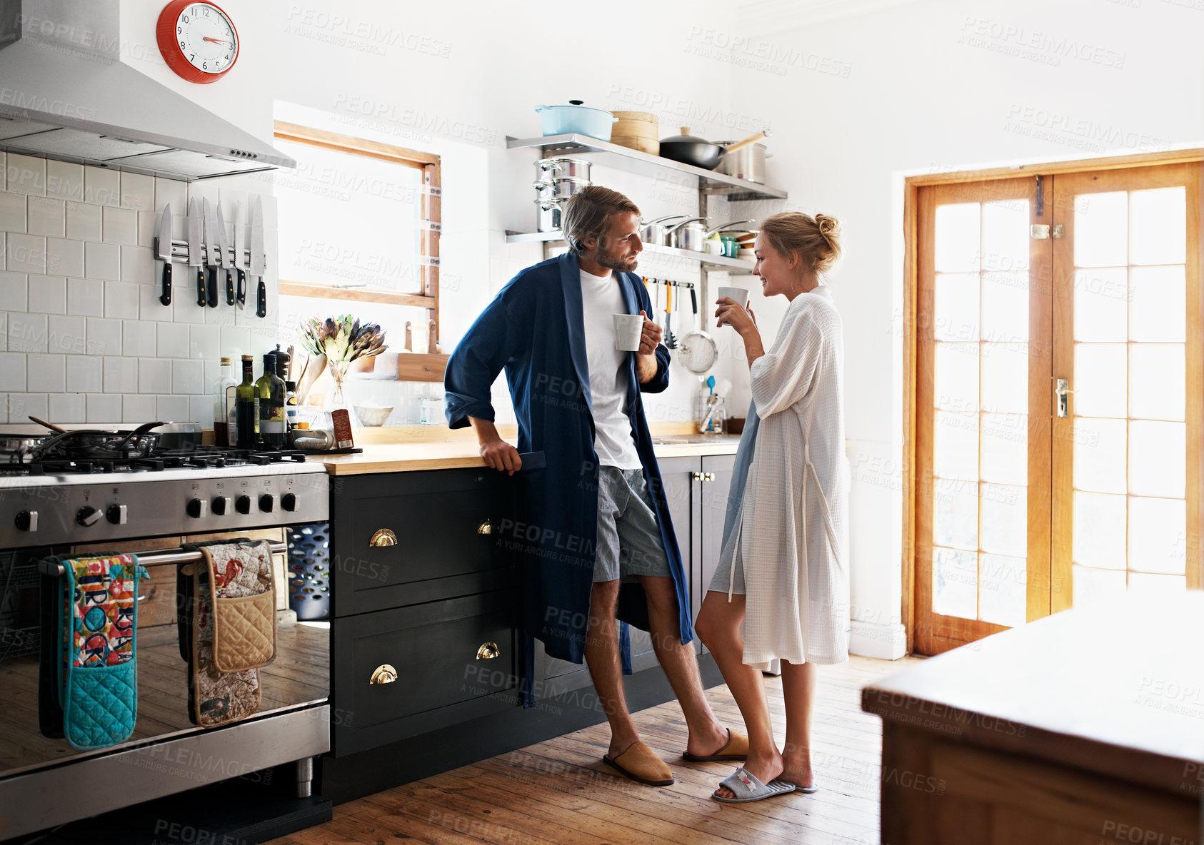 Buy stock photo Relax, smile or couple in kitchen with coffee, bonding together or connection on weekend break. Love, partner or people in home with drink, happy moment or morning routine in romantic relationship.